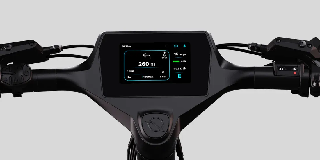 NINE09 eBike handlebar with the 4.3-inch smart dashboard showing turn-by-turn navigation